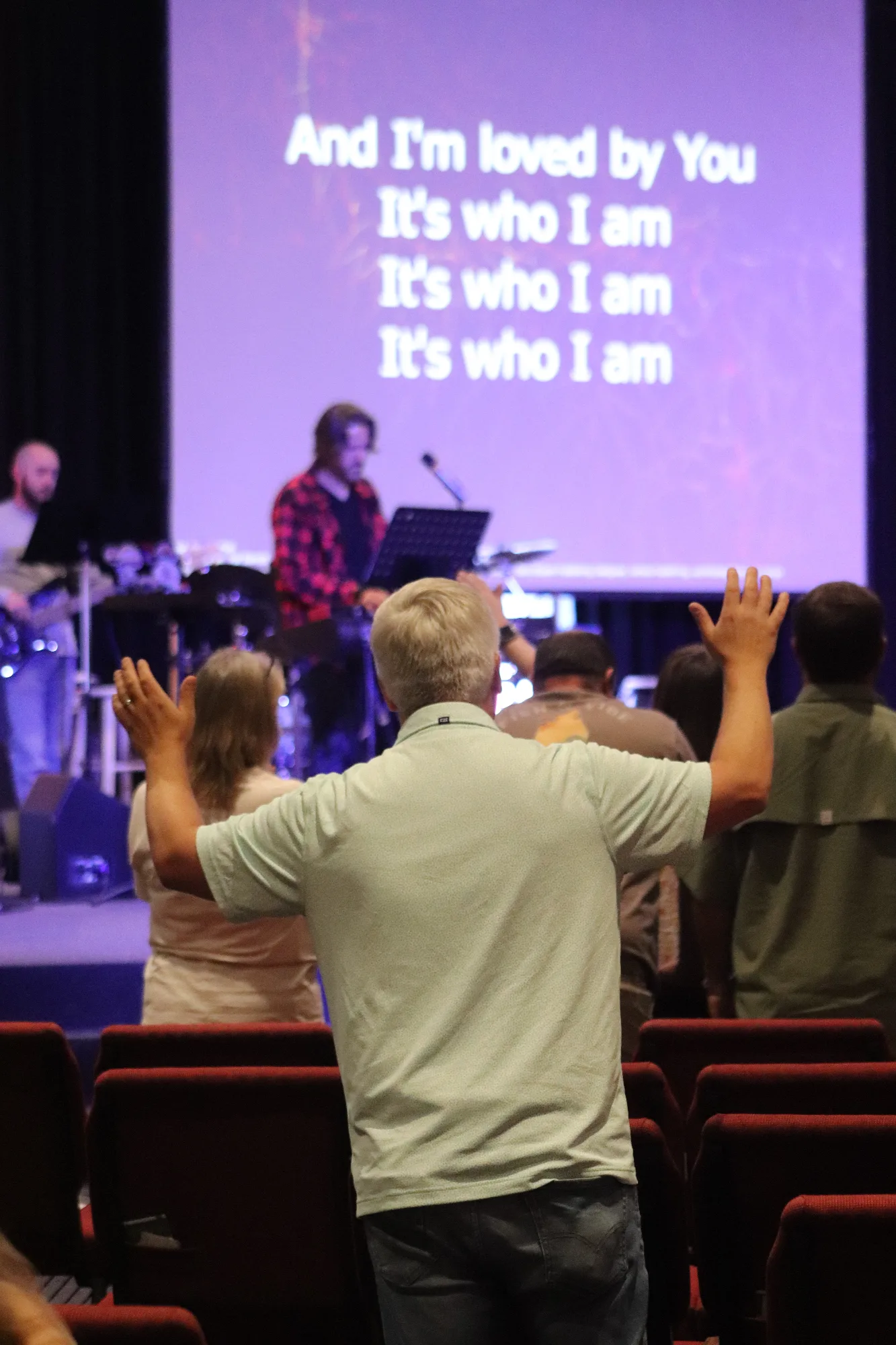 People worshipping together